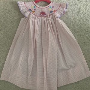 Smocked, seersucker, flutter sleeve birthday dress